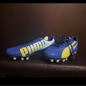 Puma Women’s Blue and Yellow Athletic Cleats